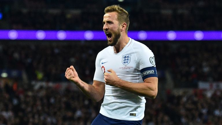 Harry Kane celebrates scoring England's second goal against Montenegro