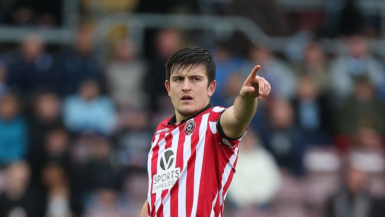 Maguire in action for Sheffield United against Northampton in October 2013