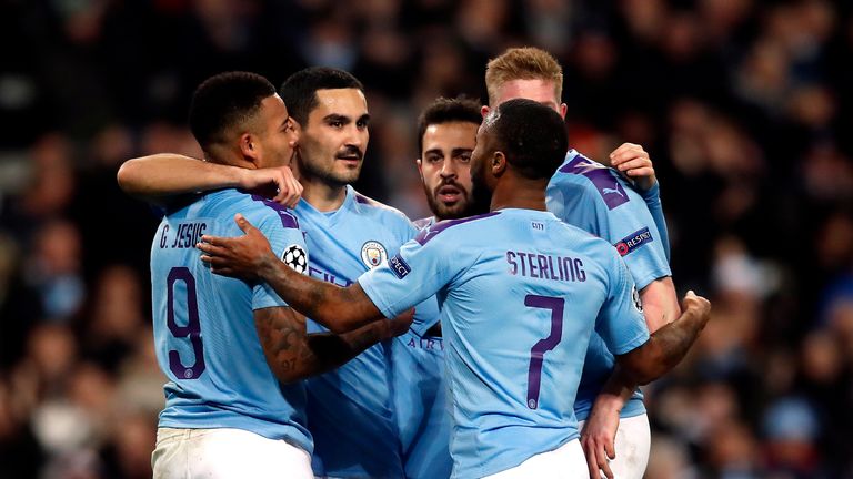 Manchester City's Ilkay Gundogan celebrates scoring his side's first goal of the game with his team-mates during the UEFA Champions League Group C match at the Etihad Stadium against Shakhtar Donetsk