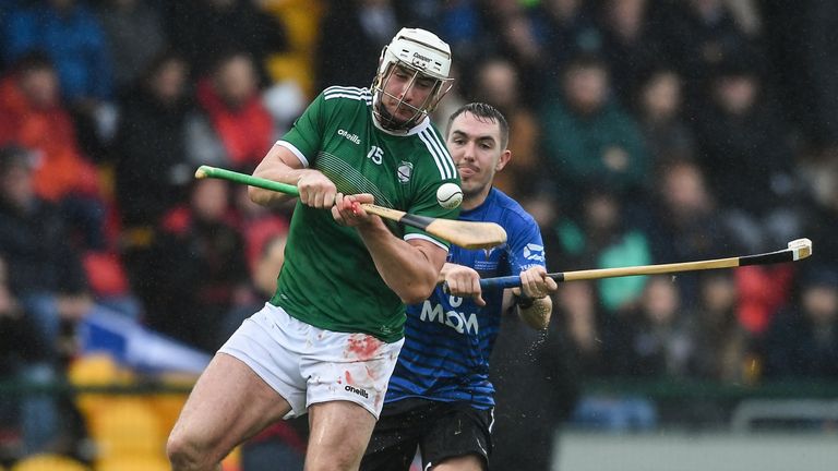 Ryan Mullaney gets a shot away for Ireland against Scotland in the hurling-shinty international match