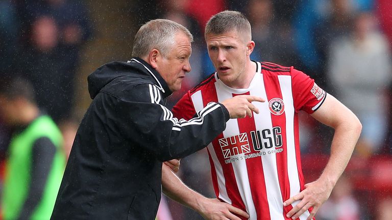 Chris Wilder gives instructions to Sheffield United's John Lundstram 