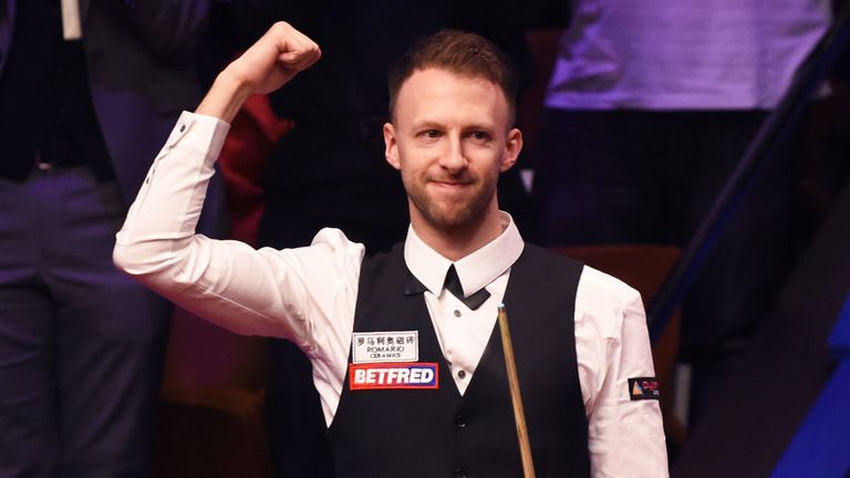 Judd Trump celebrates as he wins the 2019 Betfred World Snooker Championship final between John Higgins and Judd Trump at Crucible Theatre on May 06, 2019 in Sheffield, England