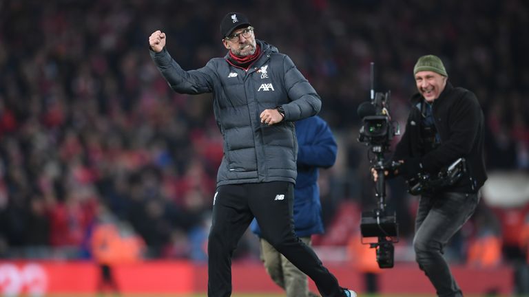 Liverpool boss Jurgen Klopp pumps his fists at full-time at Anfield