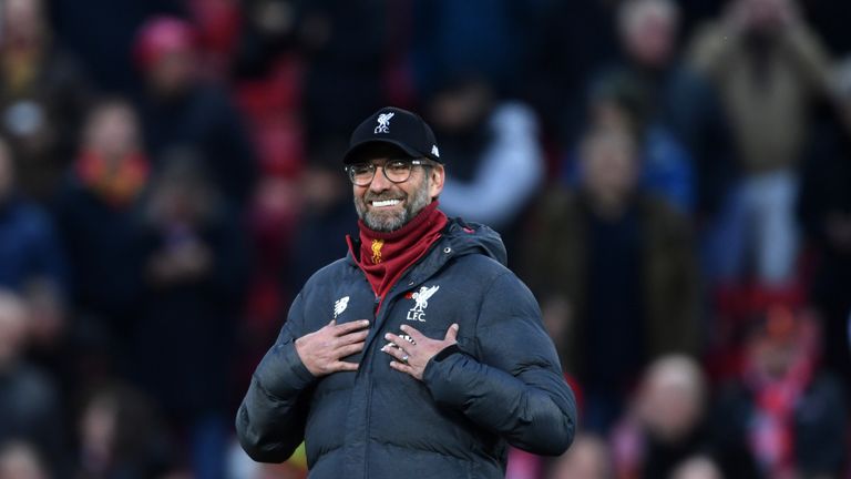 Jurgen Klopp of Liverpool looks on with ta smile ahead of the Premier League match between Liverpool FC and Manchester City at Anfield on November 10, 2019 in Liverpool, United Kingdom. (