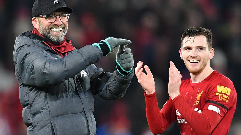 Jurgen Klopp celebrates with Andrew Robertson