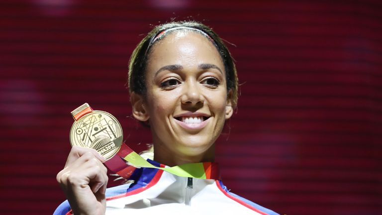 Gold medalist Katarina Johnson-Thompson of Great Britain stands on the podium during the medal ceremony for the Women's Heptathlon during day eight of 17th IAAF World Athletics Championships Doha 2019 at Khalifa International Stadium on October 04, 2019 in Doha, Qatar. 