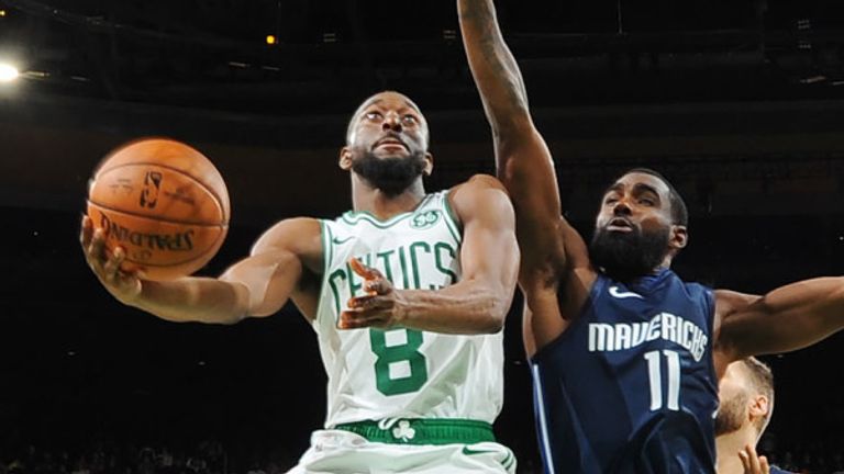 Kemba Walker of the Boston Celtics shoots the ball against the Dallas Mavericks