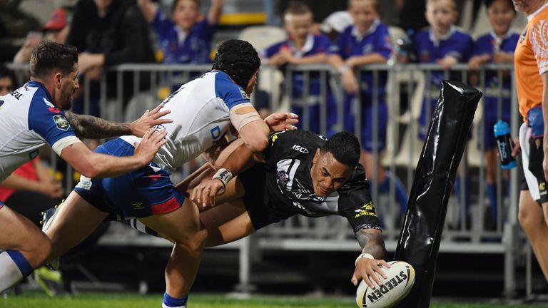 Ken Maumalo dives over to score for New Zealand