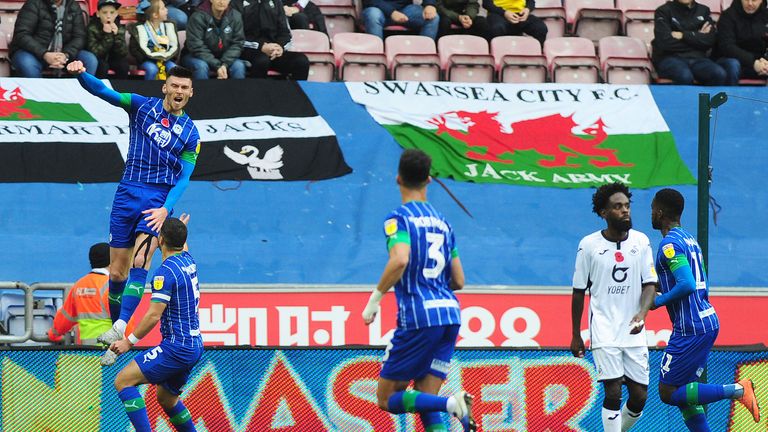 Kieffer Moore of Wigan Athletic celebrates scoring his side's equalising goal