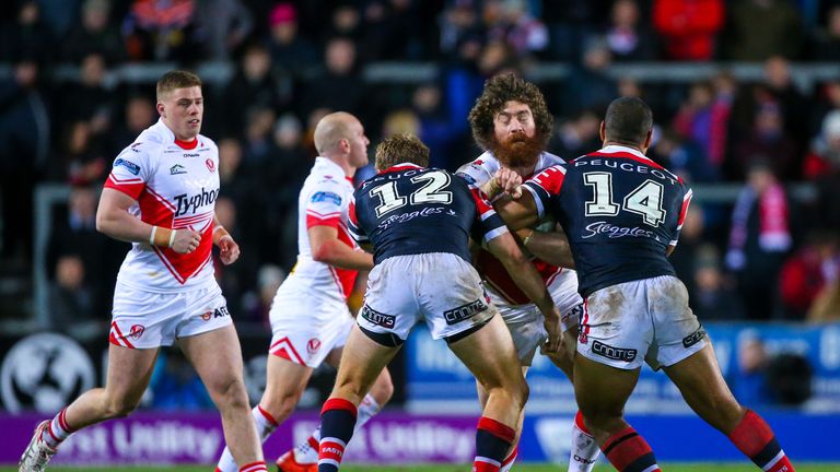Picture by Alex Whitehead/SWpix.com - 19/02/2016 - Rugby League - Dacia World Club Series - St Helens v Sydney Roosters - Langtree Park, St Helens, England - St Helens' Kyle Amor is tackled by Sydney Roosters' Mitchel Aubusson and Isaac Liu.