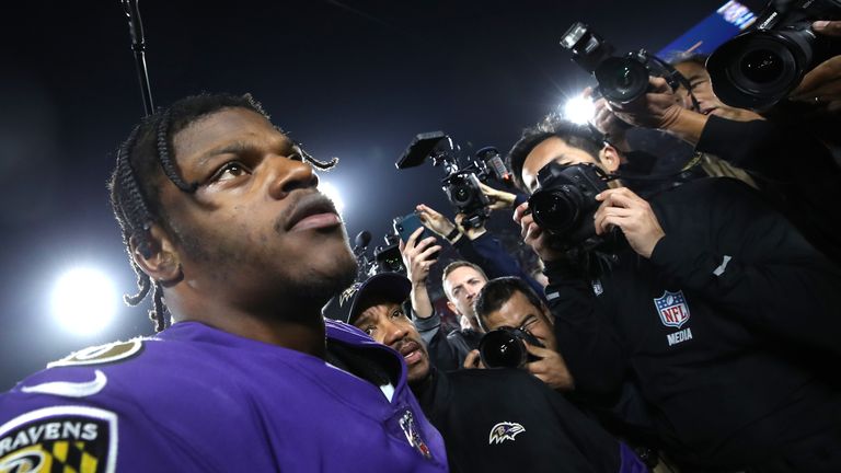 Lamar Jackson #8 of the Baltimore Ravens walks onto the field after a game against the Los Angeles Rams at Los Angeles Memorial Coliseum on November 25, 2019 in Los Angeles, California. The Baltimore Ravens defeated the Los Angeles Rams 45-6
