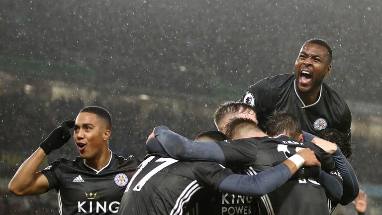 Youri Tielemans, Wes Morgan and team-mates celebrate after Ayoze Perez scores Leicester's first goal