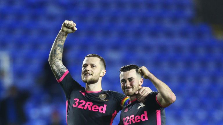 Liam Cooper and Jack Harrison celebrate Leeds' win at Reading