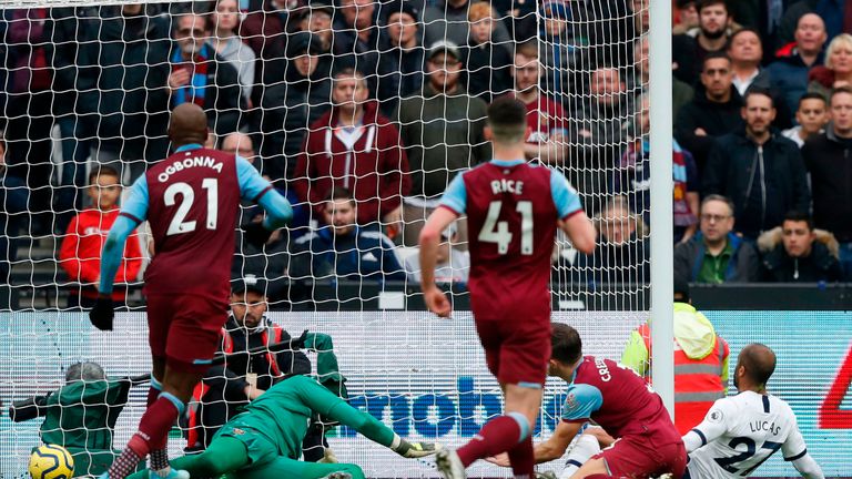 Lucas Moura slides in at the far post to double Tottenham's first-half lead