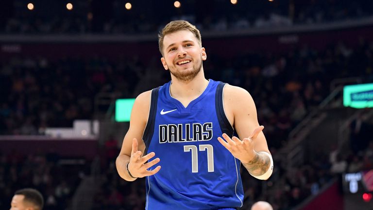  Luka Doncic of the Dallas Mavericks reacts after hitting a three during the first half against the Cleveland Cavaliers