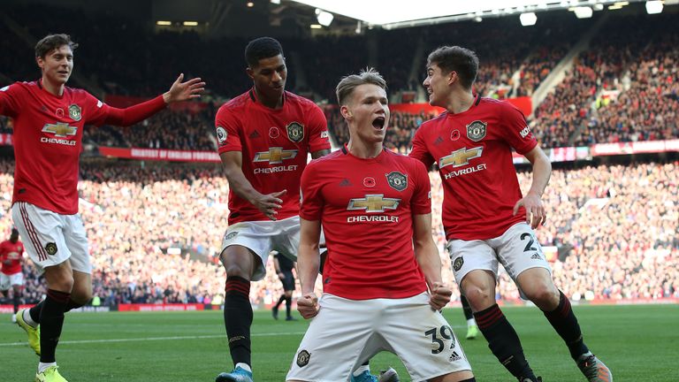 Scott McTominay celebrates Manchester United's second goal with team-mates