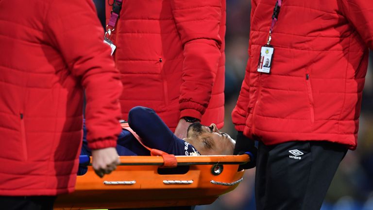 West Ham playmaker Manuel Lanzini is stretchered off injured against Burnley