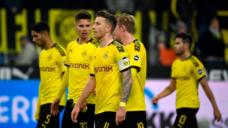 Marco Reus scored a last-gasp goal to snatch a point for Borussia Dortmund