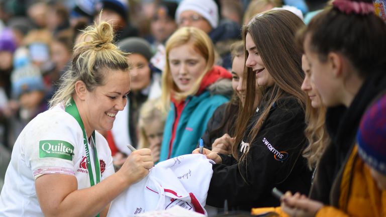 EXETER, ENGLAND - NOVEMBER 16: Marlie Packer of England Women signs an autograph during the Quilter International match between England Women and France Women at Sandy Park on November 16, 2019 in Exeter, England. (Photo by Harry Trump/Getty Images)