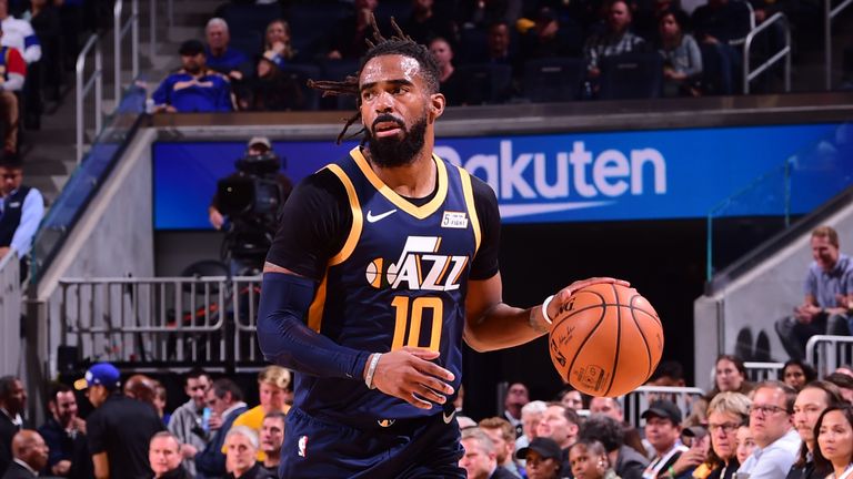 Mike Conley of the Utah Jazz handles the ball against the Golden State Warriors