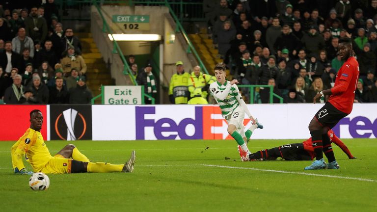 Mikey Johnston finds the bottom corner to score Celtic's third