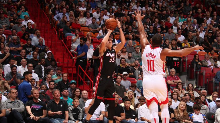 Duncan Robinson gets the shot up over Eric Gordon on his way to 23 points