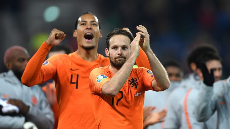 The Netherlands celebrate their qualification after drawing against Northern Ireland
