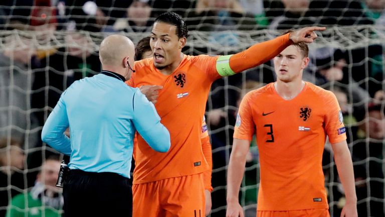 Netherlands captain Virgil van Dijk protests against the Northern Ireland penalty