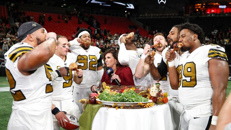 Saints players celebrated their victory with Thanksgiving turkey legs