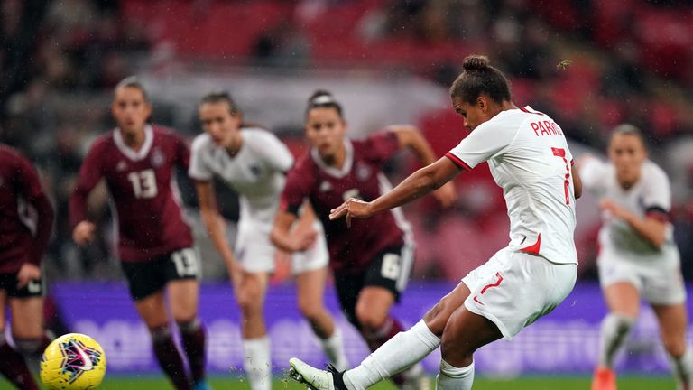 England's Nikita Parris shoots and misses from the penalty spot