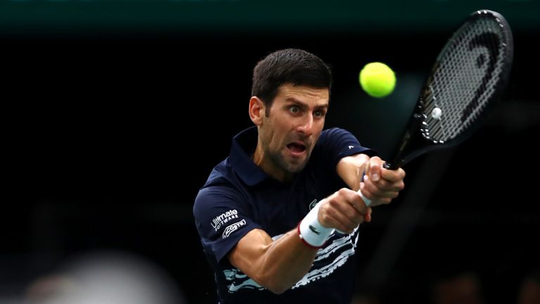 Novak Djokovic of Serbia returns a backhand in his semi final match against Grigor Dimitrov of Bulgaria on day 6 of the Rolex Paris Masters, part of the ATP World Tour Masters 1000 held at the at AccorHotels Arena on November 2, 2019 in Paris, France