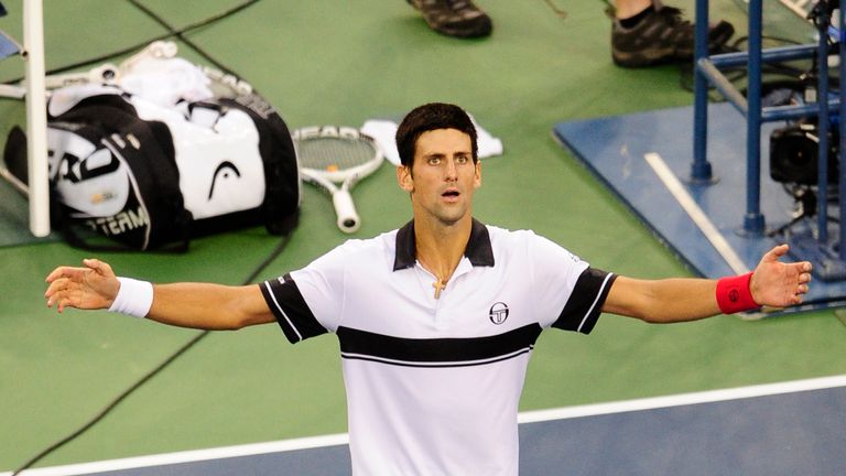 Novak Djokovic celebrates after winning against Swiss player Roger Federer, during their semifinals match at the 2010 US Open tennis tournament September 11, 2010, in New York. Djokovic won 5-7, 6-1, 5-7, 6-2, 7-5.