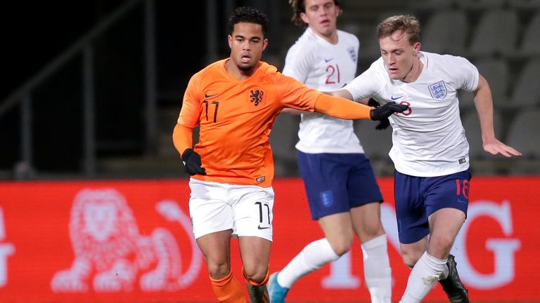 Oliver Skipp tracks the run of Justin Kluivert during the international friendly