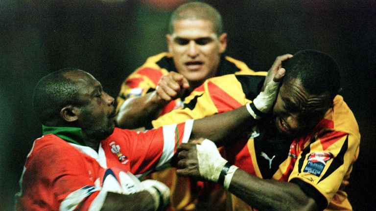 12 Nov 2000: Paul Sterling of Wales clashes with Stanley Gene of PNG during the Wales v Papua New Guinea Quarter-Final match at the Auto Quest Stadium, Widnes. Mandatory Credit: Michael Steele/ALLSPORT