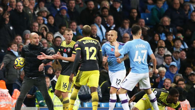 Pep Guardiola holds onto the ball after his City side had taken the lead