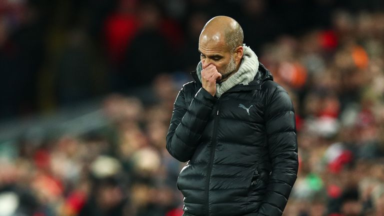 A dejected Pep Guardiola during Liverpool vs Manchester City at Anfield