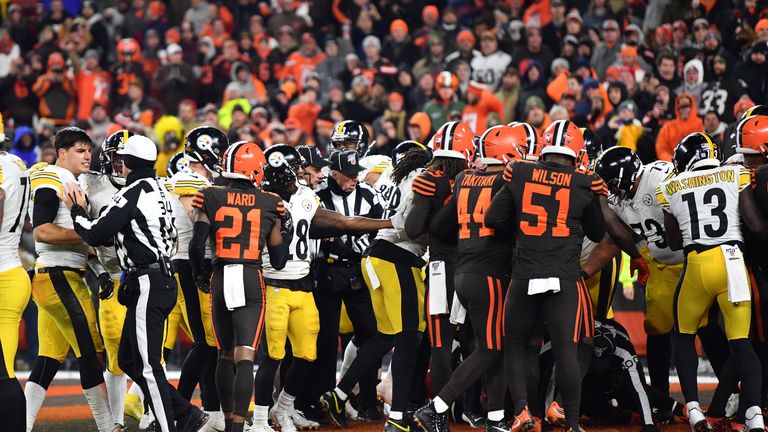 The Pittsburgh Steelers and the Cleveland Browns engage in a fight in the end zone near the end of the game