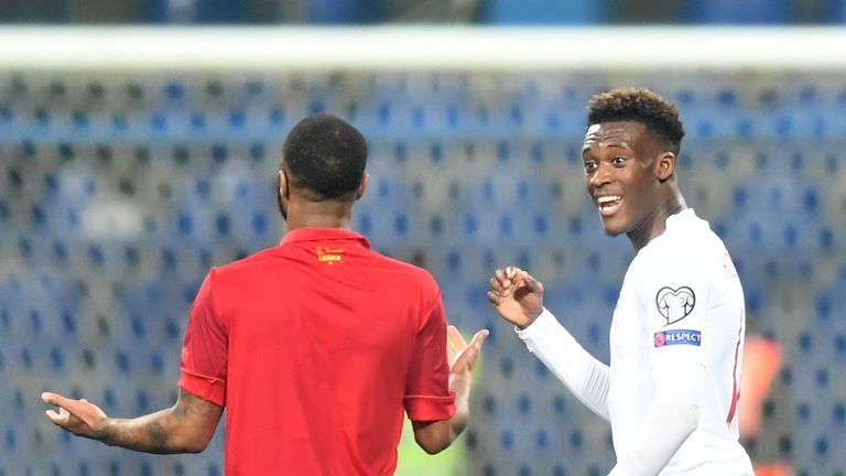 Sterling and Hudson-Odoi in conversation during England's reverse game in Montenegro