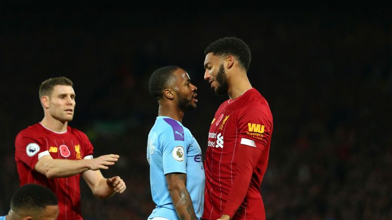 Raheem Sterling and Joe Gomez exchange words during Liverpool's 3-1 defeat of Manchester City at Anfield