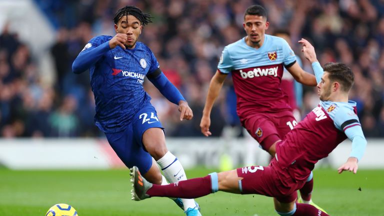Reece James looks to evade a tackle against West Ham