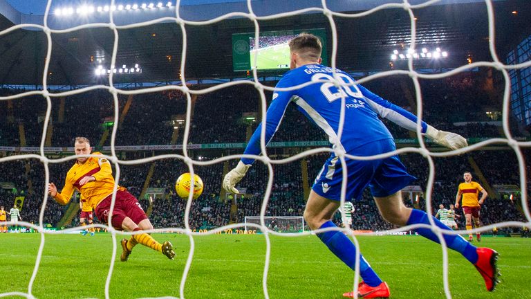 Richard Tait slices the ball into his own net to extend Celtic's lead