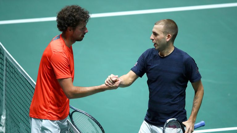 Robin Haase of the Netherlands shakes hands with Daniel Evans of Great Britain after their Davis Cup Group Stage match during Day Three of the 2019 Davis Cup at La Caja Magica on November 20, 2019 in Madrid, Spain.