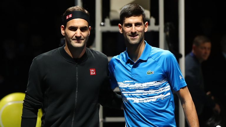 Roger Federer of Switzerland and Novak Djokovic of Serbia pose for a photo at the net prior to their singles match during Day Five of the Nitto ATP World Tour Finals at The O2 Arena on November 14, 2019 in London, England.