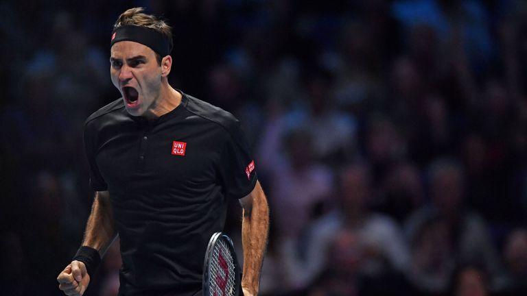 Roger Federer celebrates his straight sets win over Serbia&#39;s Novak Djokovic in their men&#39;s singles round-robin match on day five of the ATP World Tour Finals tennis tournament at the O2 Arena in London on November 14, 2019