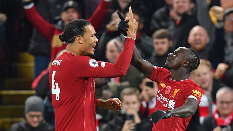 Sadio Mane celebrates his goal against Manchester City with Virgil van Dijk 