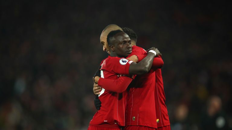 Sadio Mane and Fabinho celebrate Liverpool's win over Manchester City