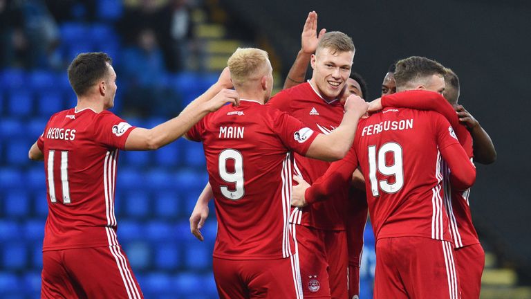 Sam Cosgrove (centre) celebrates with his team-mates after scoring for Aberdeen against St Johnstone