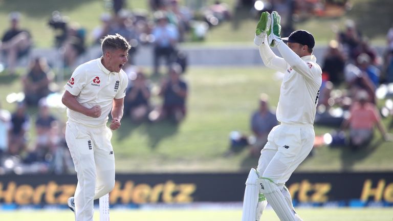 England seamer Sam Curran roars in celebration after dismissing New Zealand captain Kane Williamson