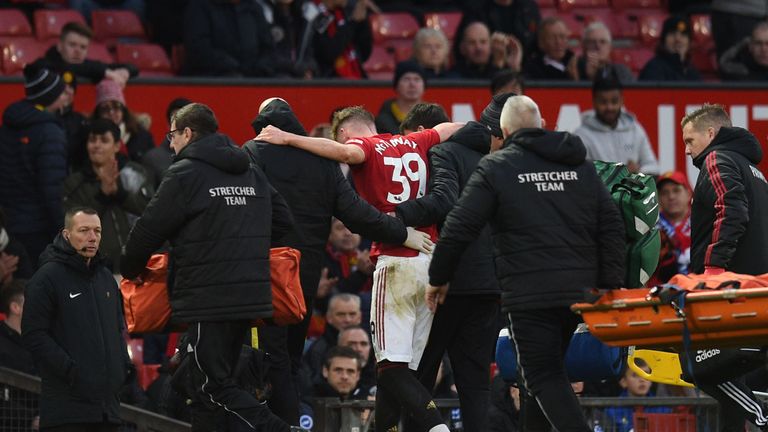 Scott McTominay was helped from the pitch in stoppage time during Manchester United's 3-1 win over Brighton