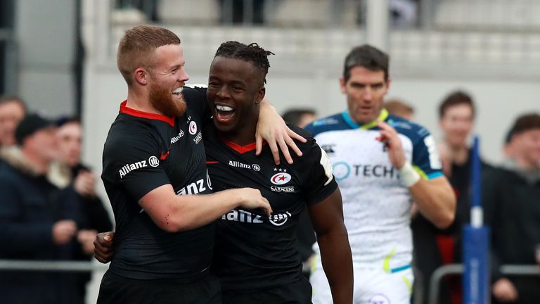 Segun celebrates his second try after a superb Elliot Daly offload